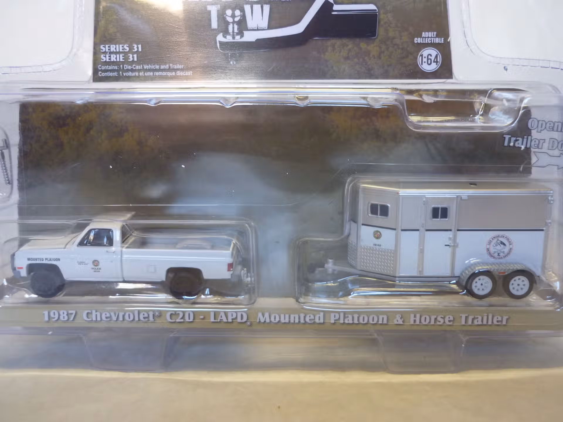 Chevrolet C20 LAPD 1987 avec remorque police 1/64° Greenlight