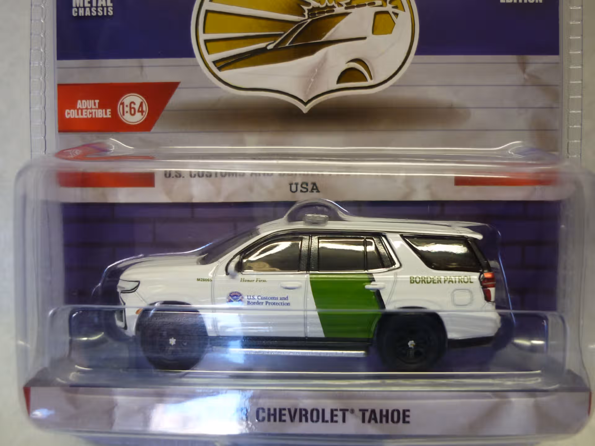 Chevrolet Tahoe 2023 police 1/64° Greenlight